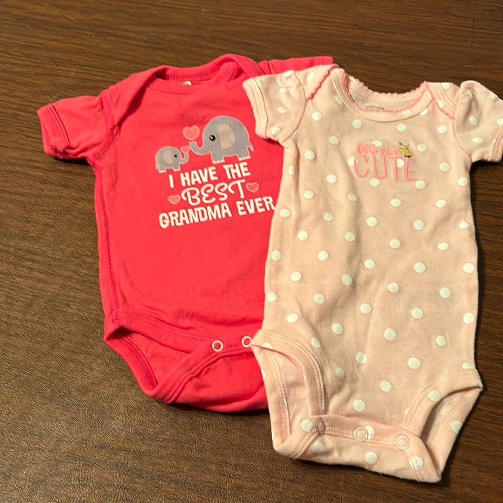 2 Newborn Girls short sleeve bodysuits pink